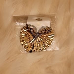 NEW! Never worn. Angel wing earrings.